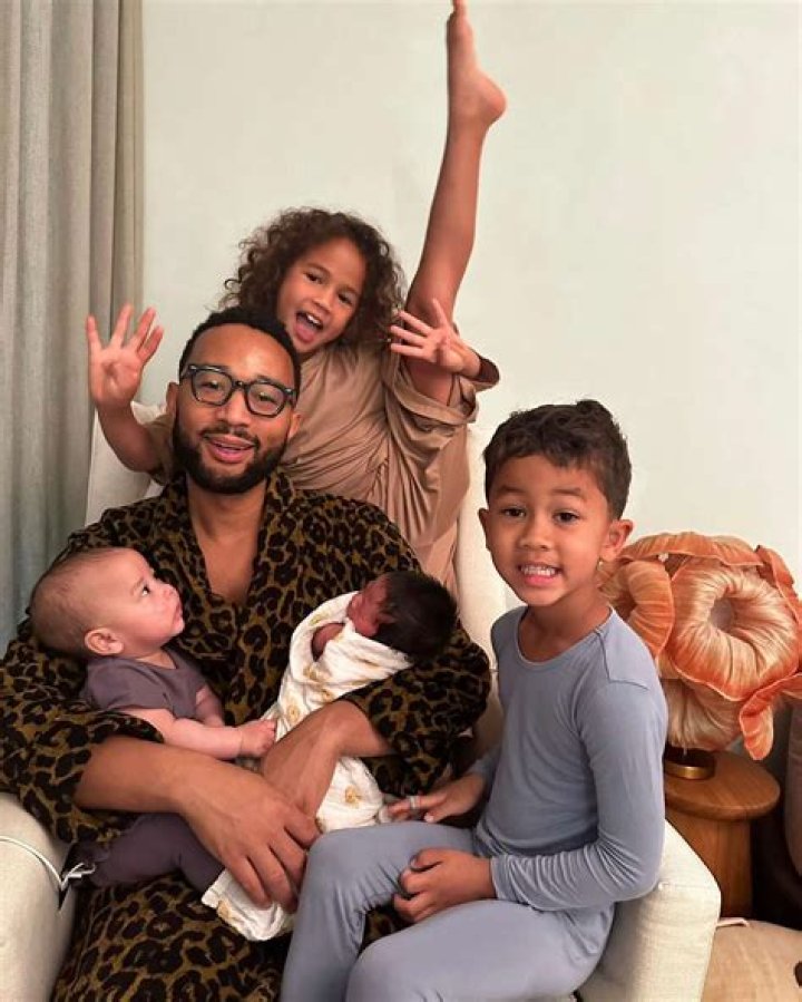 
Chrissy Teigen and John Legend Pose for Family Selfie with Santa and Mrs. Claus: ‘Big Win for Us’ 